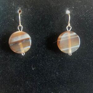 Handcrafted Brown and white bead silver tone earrings.